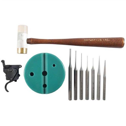 Zestaw DIY Remington 700 Timney Trigger Replacement umożliwia łatwą wymianę spustu na model Timney 510, poprawiając precyzję i komfort strzału.